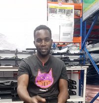 John Mbugua - Male adult performer in Nairobi