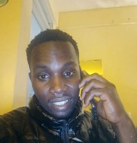 John Mbugua - Male adult performer in Nairobi
