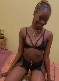Jolly Sexy African Y - puta in Bangkok Photo 3 of 3
