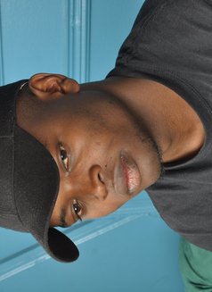 Jonatham - Male escort in Nairobi Photo 1 of 2