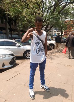 Julius - Male escort in Nairobi Photo 2 of 4