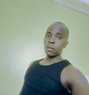 Justin - Male escort in Nairobi Photo 1 of 3