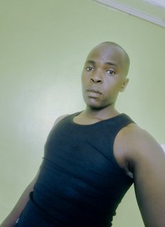 Justin - Male escort in Nairobi Photo 1 of 3
