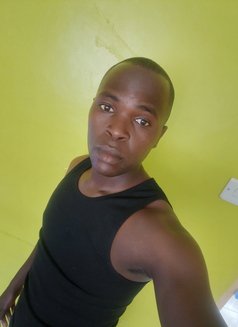Justin - Male escort in Nairobi Photo 2 of 3