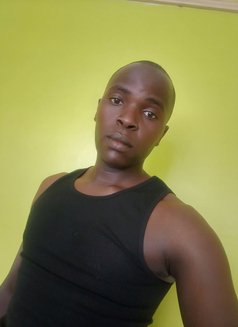 Justin - Male escort in Nairobi Photo 3 of 3