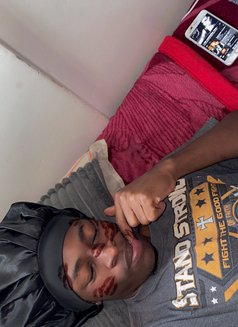 Justin - Male escort in Nairobi Photo 2 of 3