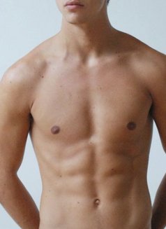 Karim - Male escort in Casablanca Photo 2 of 3