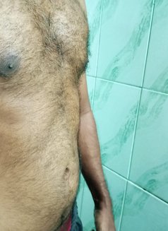 Kasun - Male escort in Colombo Photo 3 of 3