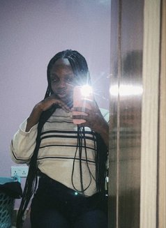 Kiki - Transsexual escort in Nairobi Photo 6 of 10
