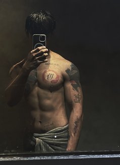 KIM - Male escort in Bali Photo 1 of 8