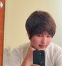 Kim - masseur in Al Manama Photo 1 of 2