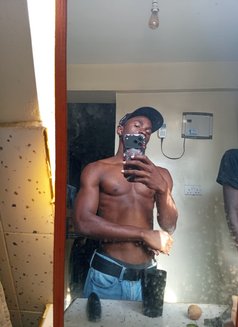 Laurence - Male escort in Nairobi Photo 2 of 3