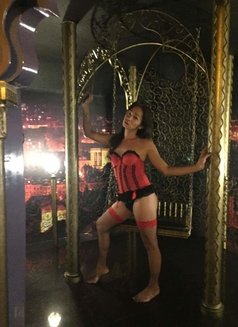 Tsmiyaka - Transsexual dominatrix in Manila Photo 2 of 12