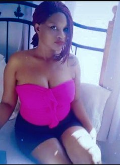 Linda - escort in Gulu Photo 3 of 3