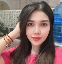 Longhee - puta in Doha