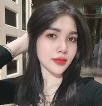 Longhee - puta in Doha