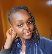Lucy Wangui - puta in Nairobi