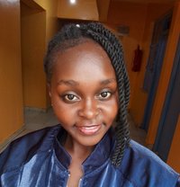 Lucy Wangui - puta in Nairobi