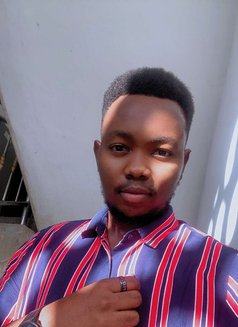 Luwi - Male escort in Mombasa Photo 1 of 9