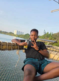 Luwi - Male escort in Mombasa Photo 2 of 9