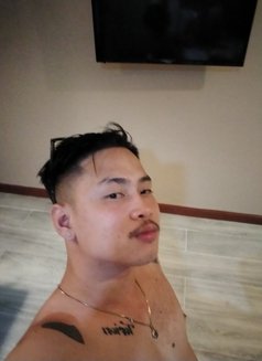 Mao - Male escort in Abu Dhabi Photo 1 of 3