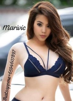 Marivic - escort in Singapore Photo 4 of 4