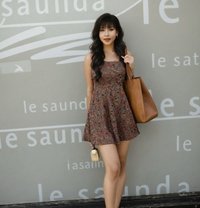 Mature & petite companion - escort in Hong Kong Photo 1 of 9