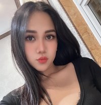 Tina - escort in Singapore Photo 2 of 2