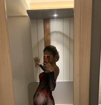 Moza Feminine Tanned Vers - Transsexual escort in Singapore