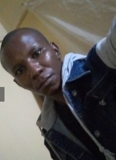 Musa - Male escort in Nairobi Photo 2 of 3