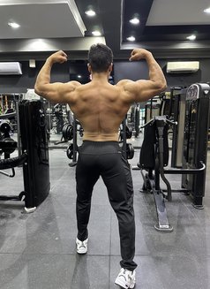 Muscle Guy in Doha, Qatar - Male escort in Doha Photo 5 of 5