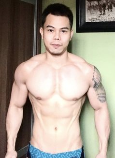 Muscular Adrian - Male escort in Macao Photo 2 of 4