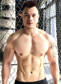 Muscular Adrian - Male escort in Macao Photo 1 of 3