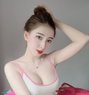 Lili - escort in Singapore Photo 3 of 5