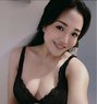 Nina - escort in Singapore Photo 5 of 5
