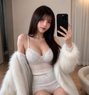 Olivia - masseuse in Singapore Photo 2 of 5