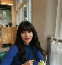 Petite & mature companion - escort in Hong Kong