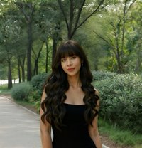 Petite & mature companion - escort in Hong Kong