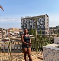 Phionah - companion in Kampala