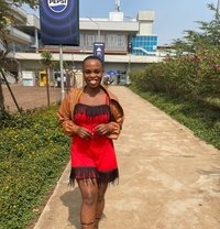 Phionah - companion in Kampala