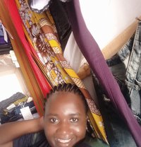 Praxides Alacha - puta in Kisumu