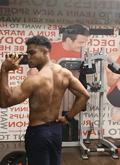 Professional male escort navel - Male escort in New Delhi Photo 8 of 9