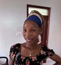 Quency Atieno - puta in Nairobi Photo 8 of 9