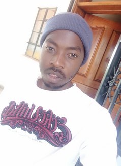 Rawlz - Male escort in Nairobi Photo 3 of 3