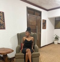 Red - escort in Nairobi