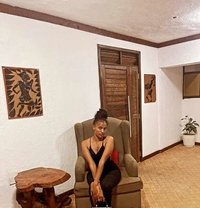 Red - escort in Nairobi