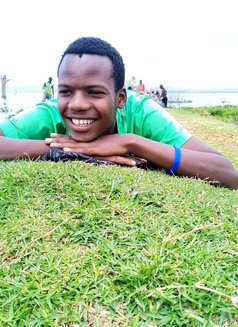 Richie - Male escort in Nairobi Photo 1 of 3