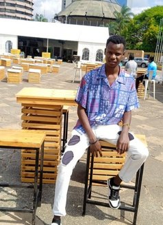 Richie - Male escort in Nairobi Photo 3 of 3