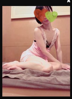 Sakura - masseuse in Okinawa Island Photo 3 of 5