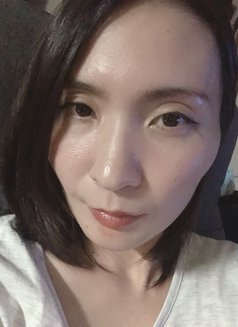 Sakura - masseuse in Okinawa Island Photo 5 of 5